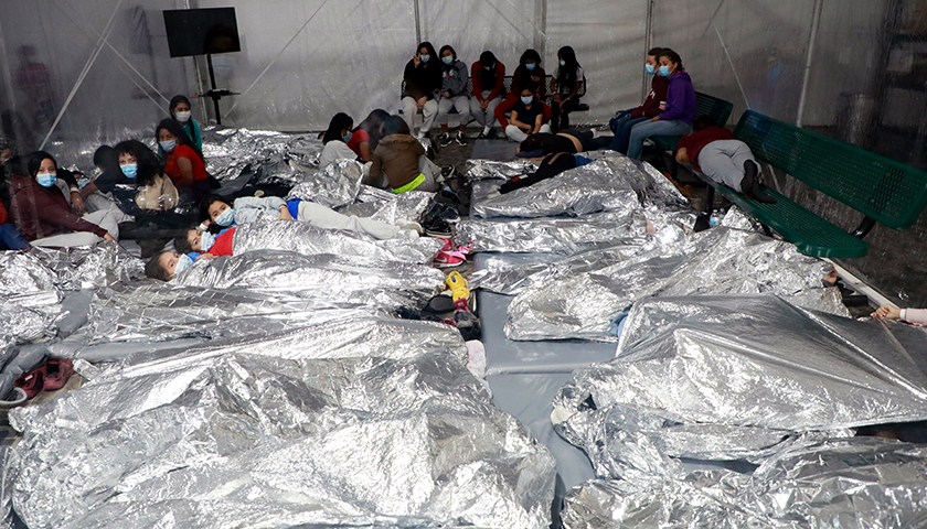 Group of immigrants at border